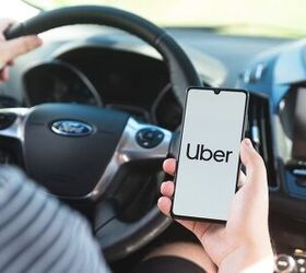 new uber shuttle promises lower cost rides without surge pricing, Uber Photo Credit Proxima Studio Shutterstock