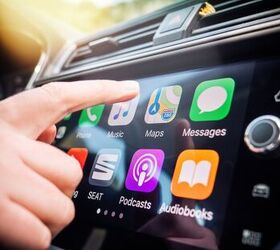 the coolest car tech you need to know about, Apple CarPlay Photo Credit Hadrian Shutterstock